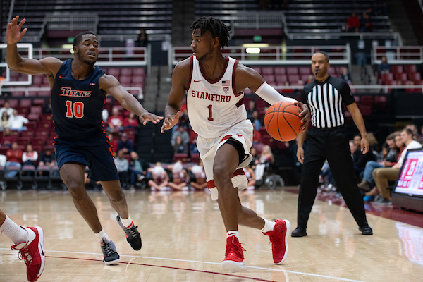 Junior guard Daejon Davis (above) went six-for-seven from the field and tied junior forward Oscar da Silva for the team-lead with 14 points as Stanford breezed past Cal State Fullerton in the second outing of the season. (Photo: MIKE RASAY/isiphotos.com)