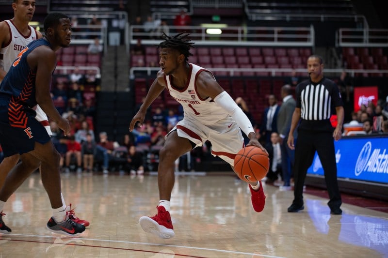Junior guard Daejon Davis (above) is averaging a team-high 33 minutes and four steals per game through the Cardinal's first two contests. Davis is one of five Cardinal shooting at least 50% from the field and is averaging eight points per game (MIKE RASAY/isiphotos.com).