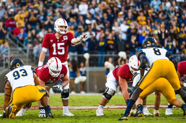 In his fifth career start and first in the Big Game, junior quarterback Davis Mills (#15 above) completed 26-of-35 passes for 285 yards, one touchdown and two interceptions. Despite his efforts, Cal handed the Cardinal a 24-20 loss at the 122nd Big Game on Saturday. (Photo: SAM GIRVIN/The Stanford Daily)