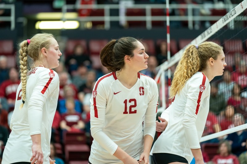 Kathryn Plummer (left) and Audriana Fitzmorris (center) combined for 30 kills while Holly Campbell (right) paced the floor with 6 blocks. Stanford swept Cal Poly in the second round of the NCAA tournament with one of the Cardinal's better offensive outings of the year. (GLEN MITCHELL/isiphotos.com)