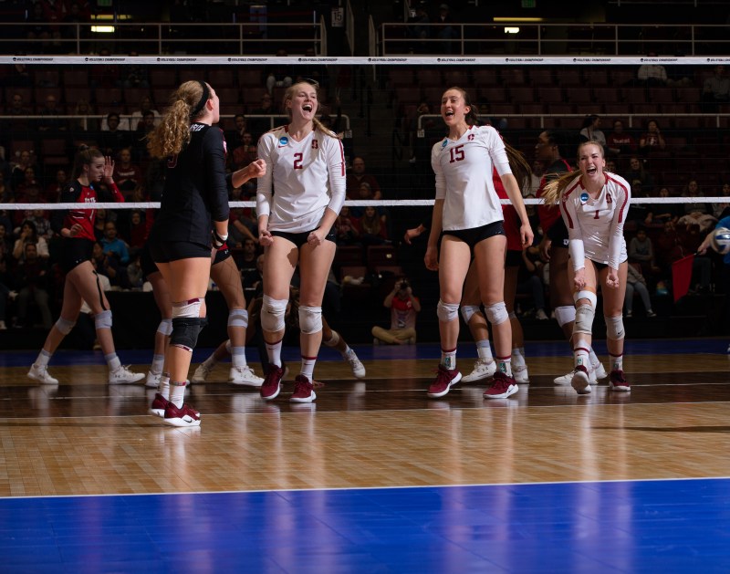 Thanks to the offensive performances from outside Kathryn Plummer (No. 2, above) and Madeleine Gates (No. 15, above), Stanford swept Penn State in three sets. Plummer turned in 24 kills and Gates added 11 more, as both players hit over .500. (Photo: MIKE RASAY/isiphotos.com)