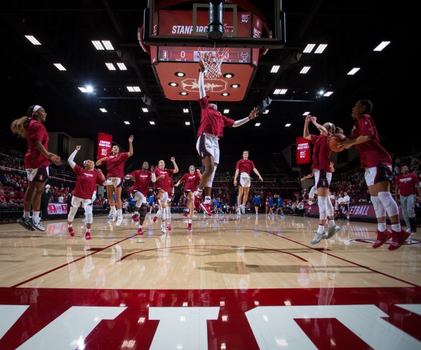 In what has become a pregame tradition, freshman forward Fran Belibi (above) has dunked to conclude warmups. Belibi is one of four freshmen flying high to start the season. (Photo: ERIN CHANG / isiphotos.com)