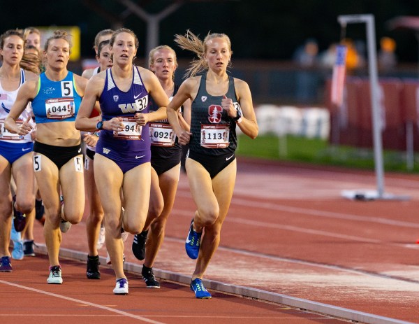 Junior Jess Lawson (above) is scheduled to compete in the mile on Saturday. She's opening her indoor track season after her best cross country season, placing 11th overall and second for Stanford at the national championships in November. (Photo: John P. Lozano / isiphotos.com)