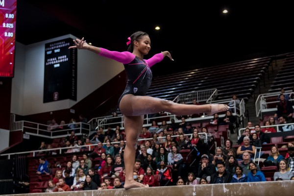 In the season-opening Collegiate Challenge on Jan. 4, junior Kyla Bryant (above) posted a career-high mark of 9.950 on bars and 9.900 on floors as the Cardinal held its own against ranked competition. (Photo: KAREN AMBROSE HICKEY / isisphotos.com)