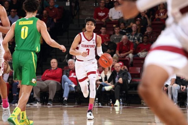 Freshman guard Tyrell Terry (above) posted a team-high 14 points for men's hoops against Utah on Thursday. The team struggled to build momentum in the road contest, and lost 64-56 in overtime. (PHOTO: Bob Drebin/isiphotos.com)