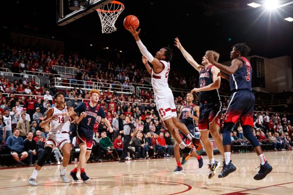 Sophomore guard Bryce Wills (above, right) posted a career-high 25 points against Arizona in Stanford's fourth straight loss on Saturday. The team now travels to Washington to take on the Huskies and Cougars on Thursday and Sunday, respectively. (PHOTO: Bob Drebin/isiphotos.com)