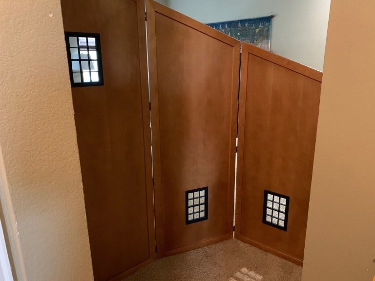 Josh Cobler '20 is self-quarantining at his family's home in Plano, Texas. His family has set up a wooden screen that separates his two rooms from the rest of the house. (Photo courtesy of Josh Cobler)