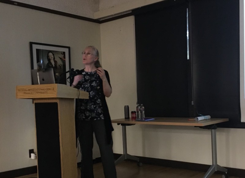 Karen Eggleston discussed the chances that the coronavirus epidemic could expand into a pandemic in a talk on Tuesday. (Photo: LANA TLEIMAT / The Stanford Daily)
