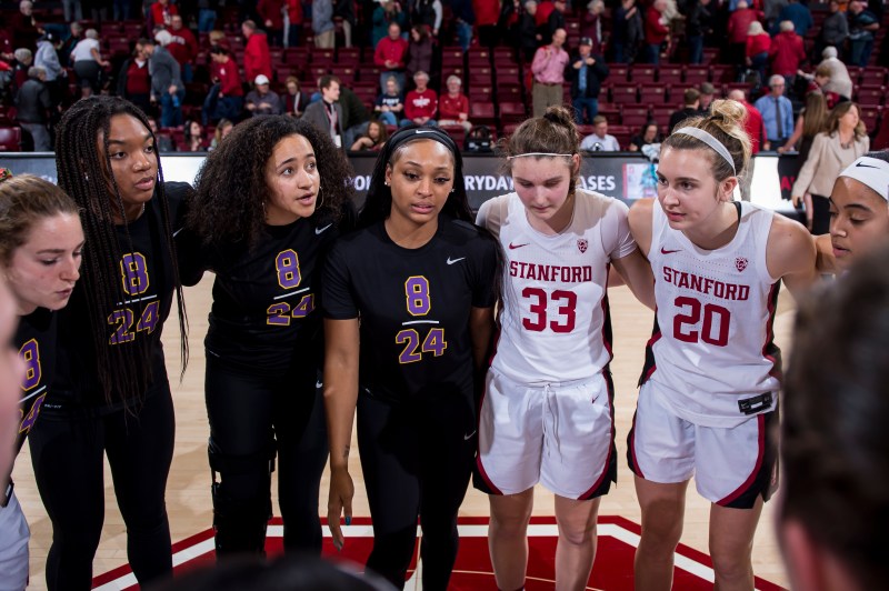 Senior guard DiJonai Carrington (center, above) and junior guard Estellla Moschkau (second from right, above) will both be transferring for next season. Carrington was injured for much of her final year at Stanford, and Moschkau received limited playing time. (PHOTO: Karen Ambrose Hickey/isiphotos.com)