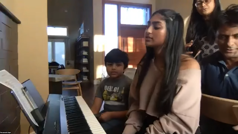 The Gopi Family (father Paramesh Gopi from Stanford Medicine and his  children Kaanchana and Shankaran) perform a traditional Indian healing prayer on the keyboard during last week's "Stuck@Home" concert. (Photo: Stanford Medicine & the Muse).