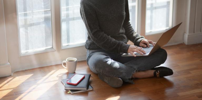 woman-in-gray-sweat-shirt-sitting-beside-window-3759080