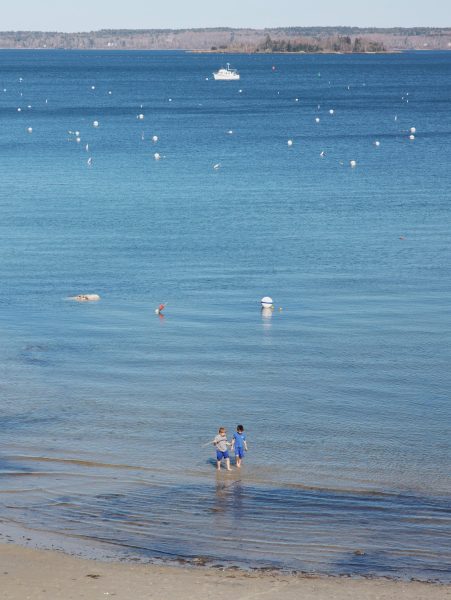 Children play in the ocean at a public beach in Falmouth, Maine. (Photo: KATIE HAN/The Stanford Daily)