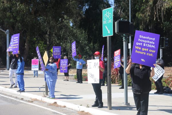 Workers practiced social distancing while protesting Stanford Health Care's TWA. (DANIEL WU/The Stanford Daily)