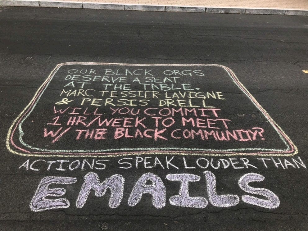 Students chalk Jane Stanford Way with calls for policies, actions against anti-Black racism