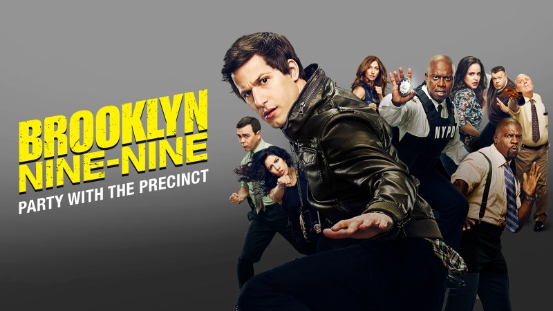 Photo of the Brooklyn Nine-Nine cast posing with serious yet expressive face.