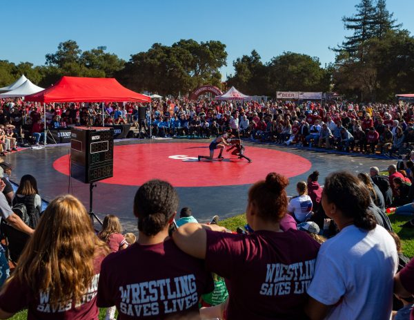 Gabriel Townsell '20 (above) wrestles in a win over Columbia at Football Fan Fest before football's Big Game in Stanford Stadium. (Photo: JOHN P. LOZANO/isiphotos.com)