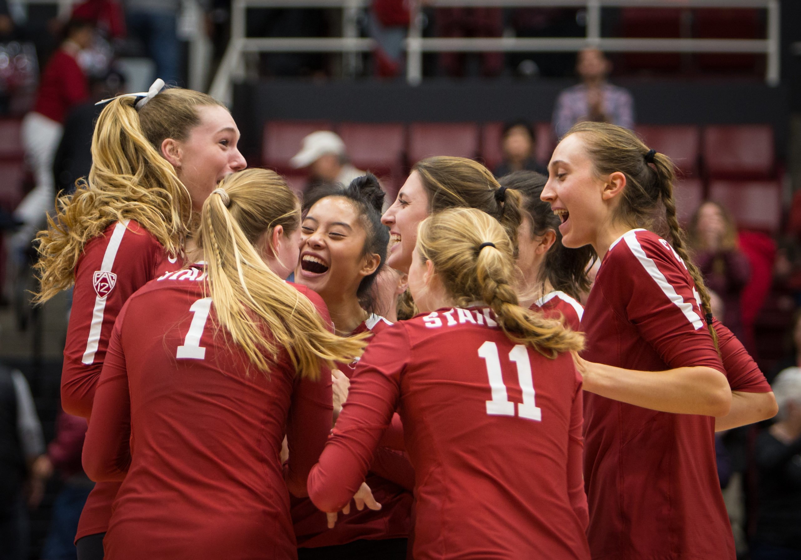 The Stanford Women's Volleyball team celebrates a point.