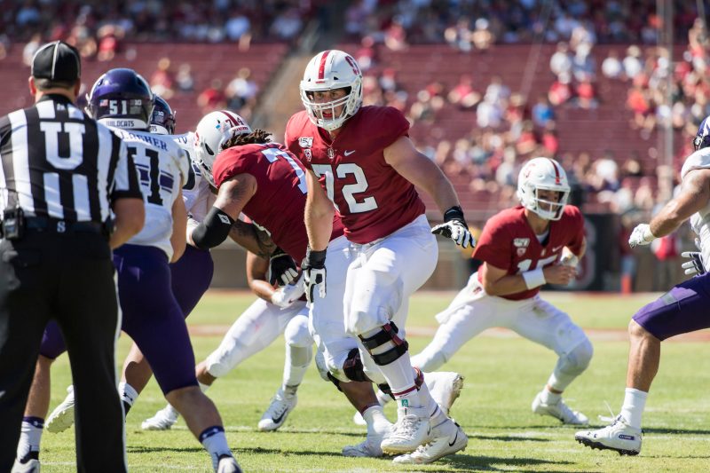 Walker Little (above, center) becomes the first Cardinal football player to opt out of a potential spring season. He is ranked as the fifth-best offensive tackle in the draft by ESPN's Mel Kiper Jr. (Photo: KAREN AMBROSE HICKEY/isiphotos.com)
