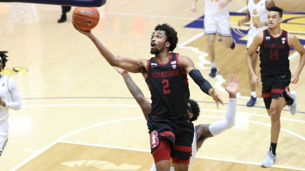 Junior guard Bryce Wills (above, No. 2) finished with 13 points, seven rebounds and four assists and sophomore forward Spencer Jones (above, No. 14) hit two timely three pointers to help seal a 78-75 Cardinal victory on Saturday. (Photo: ANDY MEAD/isiphotos.com)