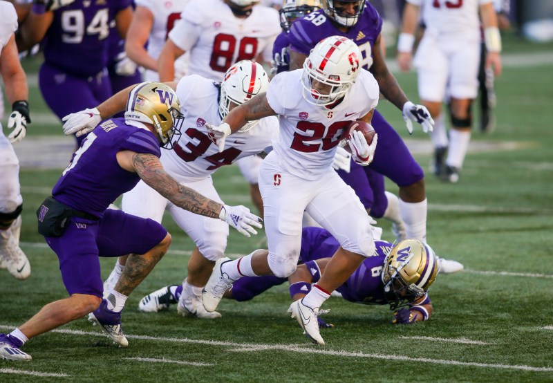 Sophomore running back Austin Jones (above, 20) powered his way to 138 yards and two touchdowns on Saturday. He and the rest of the Cardinal offense put up 31 points against a top-25 Washington team in the upset. (Photo: SCOTT EKLUND/University of Washington Athletics)
