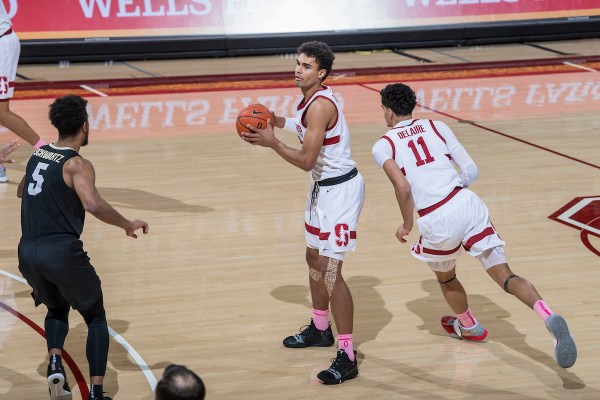 Senior forward Oscar da Silva (left) and junior forward Jaiden Delaire (right) led the way for the Cardinal on Thursday night against the Huskies. The pair combined for 33 points in the 79-61 Stanford win (Photo: KAREN HICKEY/isiphotos.com)