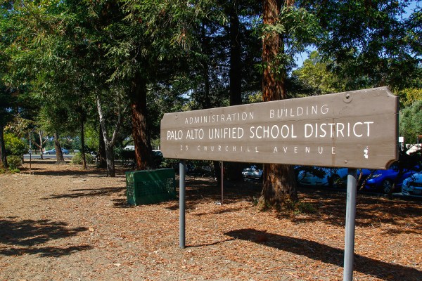 Wooden signpost for the administration building of The Palo Alto Unified School District. (Photo: Veronica Weber)