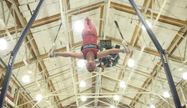 Sophomore Riley Loos (above) earned MPSF Gymnast of the Week honors in his season debut for the Cardinal. (Photo: CODY GLENN/ISI Photos)