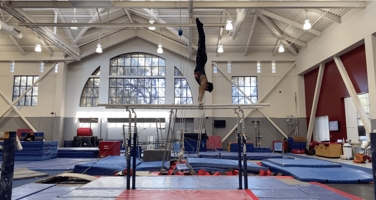 Senior Blake Sun (above) earned the event title with a 14.650 on the parallel bars. The Cardinal ultimately lost to William & Mary in opening meet of the season. (Photo: JORDAN JOHN LEE/The Stanford Daily)