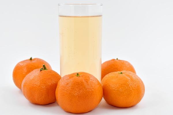 Depiction of oranges vomiting into a glass of water to produce La Croix. (Photo: BICANSKI/Pixnio.com)