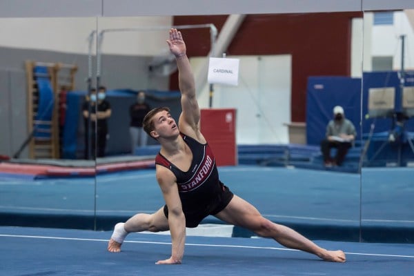 Junior Blake Wilson (above) earned his fourth individual title on the floor exercise with a career-best 14.600 in Stanford's season-high victory over Cal. (Photo: KAREN HICKEY/isiphotos.com)