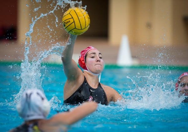 Junior 2-meter defender Chloe Harbilas goes for a pass against Cal in 2020. Harbilas scored five goals in Stanford's win against San Jose State. (Photo: ERIN CHANG/isiphotos.com)