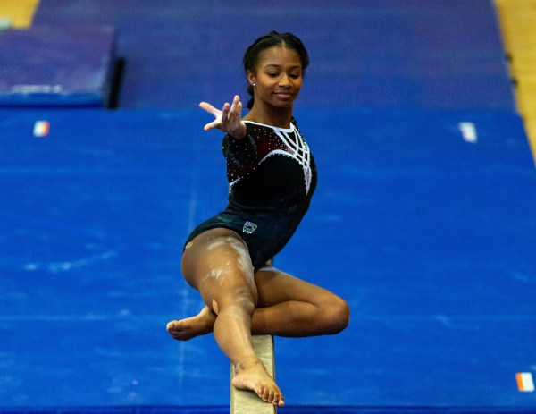 Senior Kyla Bryant (above) earned two scores of 9.900 on the vault and uneven bars and a 9.875 on the balance beam en route to her first all-around title of the season. (Photo: JOHN LOZANO/isiphotos.com)