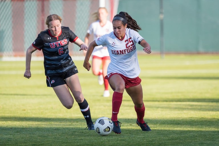 Freshman forward Samantha Williams (above) runs away from a Utah defender in last week's 5-0 Stanford win. Williams already has scored three goals this season. (Photo: JIM SHORIN/isiphotos.com)