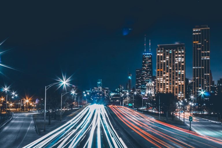 Pictured: a blurred city street at night.