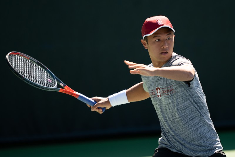 Senior Timothy Sah (above) is the reigning Pac-12 Player of the Week after clinching two Cardinal wins last week. Stanford men's tennis will face Washington on Sunday to close the regular season. (Photo: DON FERIA/isiphotos.com)