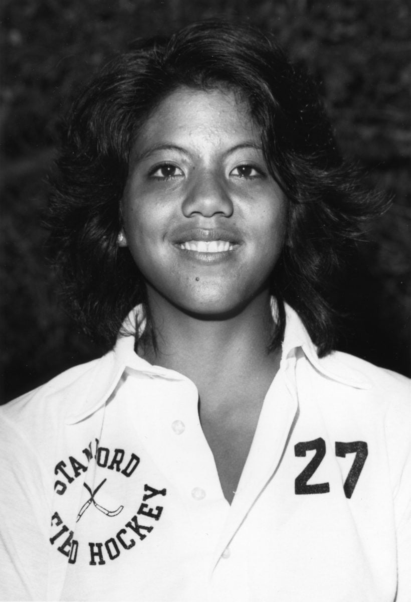De los Reyes portrait photo from her time on the field hockey team in 1982
