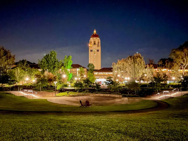 Photo of Hoover Tower, Green Library, and Meyer Green at night