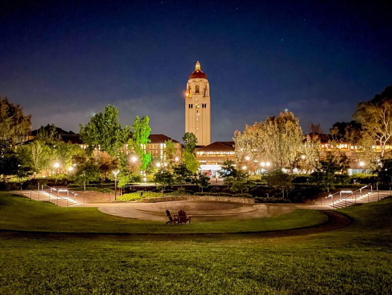 Photo of Hoover Tower, Green Library, and Meyer Green at night