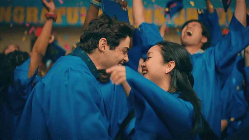 Pictured: Laura Jean Covey and Peter Kavinsky from “To All the Boys I Loved Before: Always and Forever” celebrate their high school graduation. (Photo: Netflix)