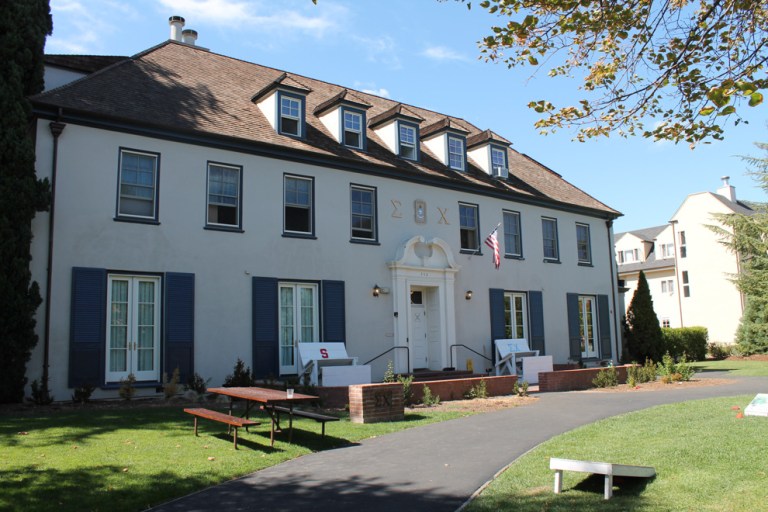 Large house with Greek letters sigma and chi