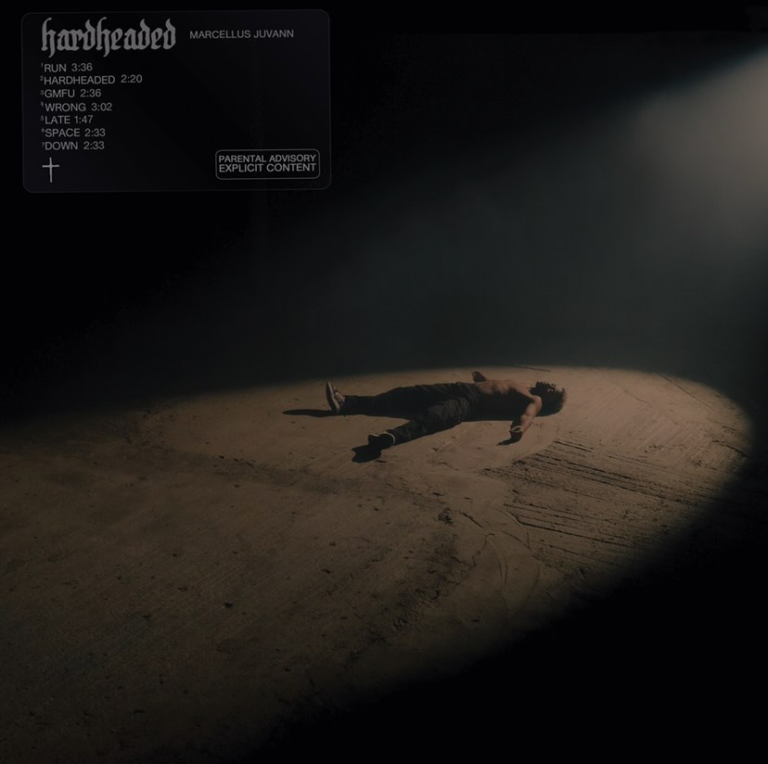 Marcellus Juvann lies on the ground in the album cover for "Hardheaded"
