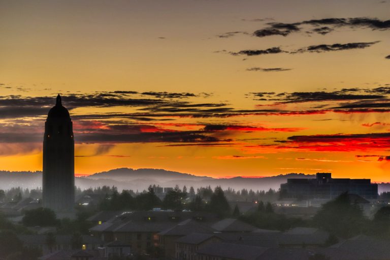 Pictured: Stanford campus at sunset. (Photo: Yu Wang/Unsplash)