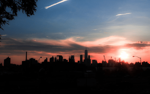 Sunset against a New York City skyline