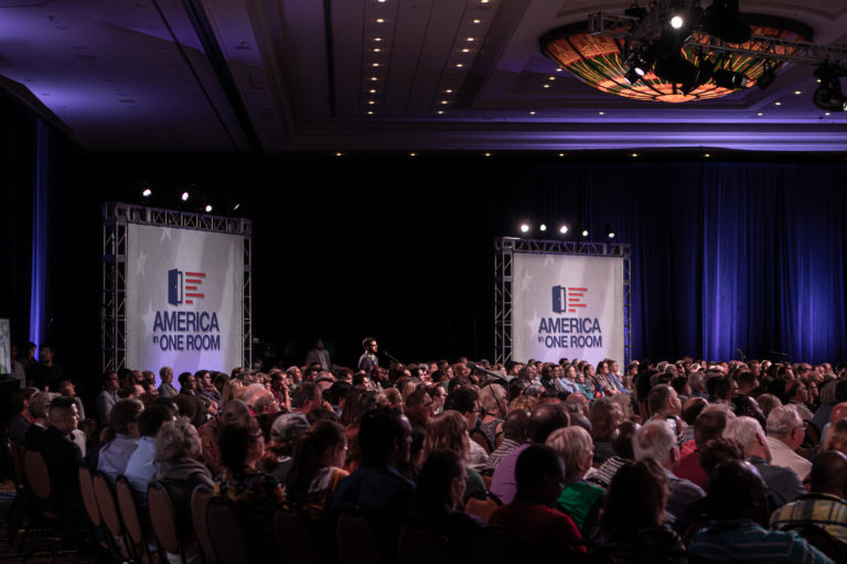 Many people at the America in One Room event