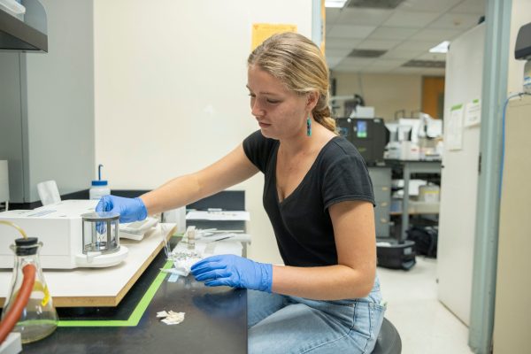 Student conducting research in a lab