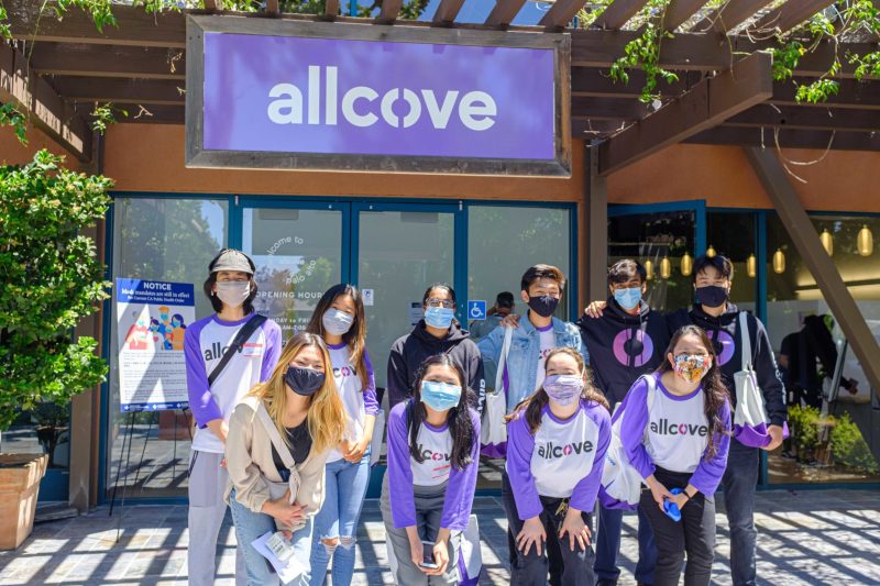 Allcove Youth Advisory Group members posing for a picture in front of the new Allcove center