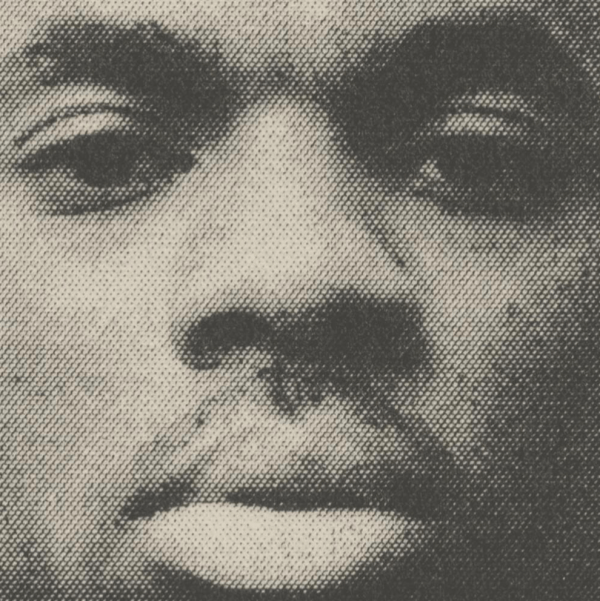 The album cover of "Vince Staples" - a close up in black and white of a man's face.