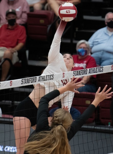 Redshirt sophomore Caitie Baird rises up for a spike.