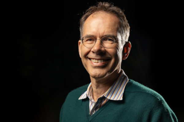 A headshot of Stanford economics professor Guido Imbens