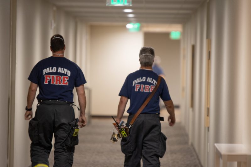 Firemen from Palo Alto Fire Department inspect the eighth floor of EVGR. (Photo: THOMAS YIM/The Stanford Daily)